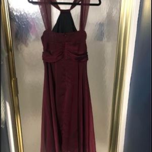 Burgundy semi formal tee length dress. Only worn once and has been dry cleaned.